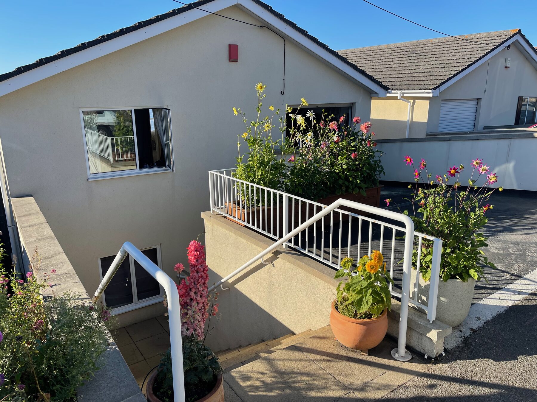 Redcliffe View, front of the house and steps down to the front door